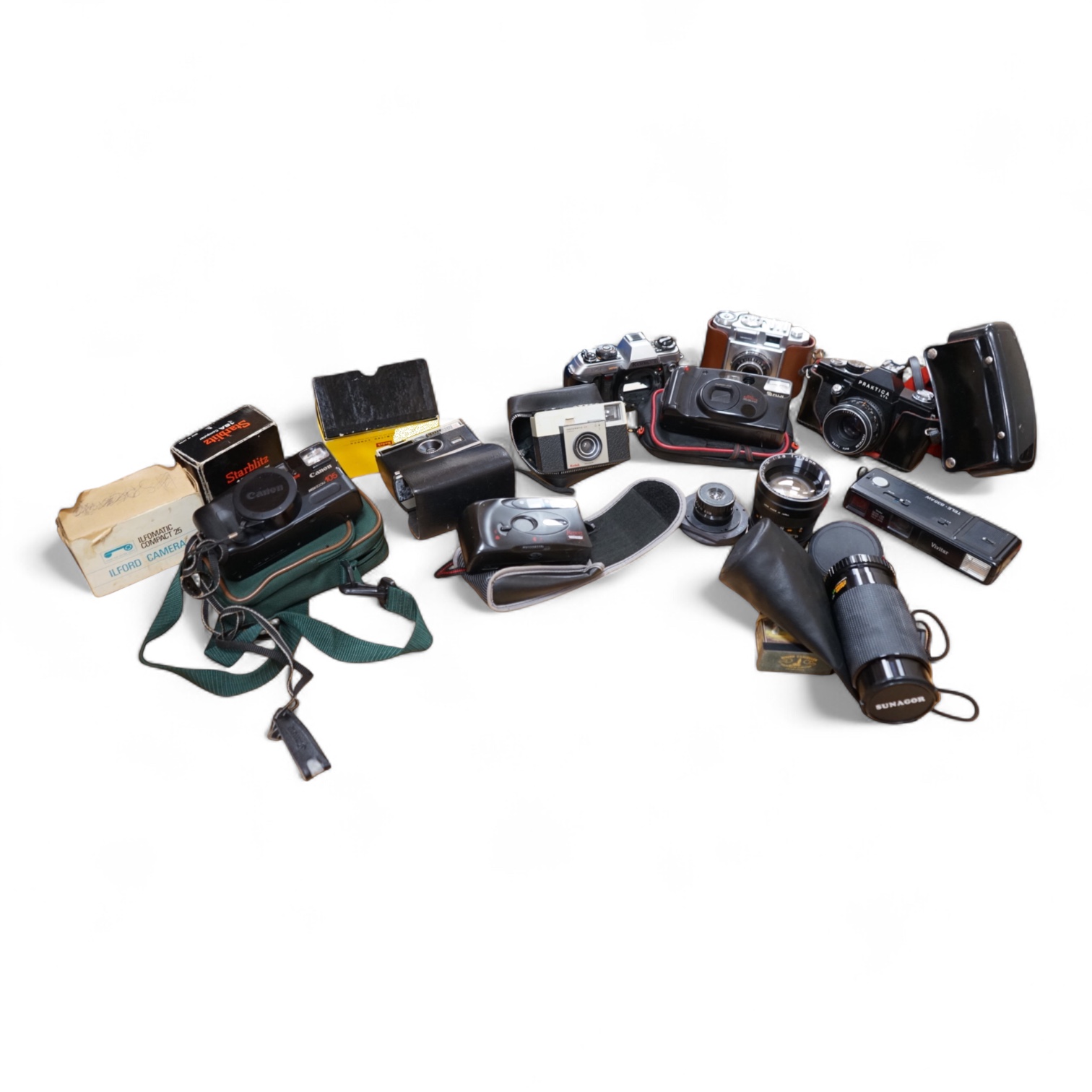 A collection of various cameras and camera equipment to include Konica